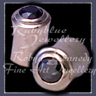 14 Karat Gold and Black Diamond Ear Plug Image