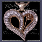14 Karat White Gold, Ammolite, Diamond and Glacial Blue Topaz 'Glaciallation' Pendant Im10 Karat Yellow Gold and Diamonds 'Dolly's Heart' Pendant Image