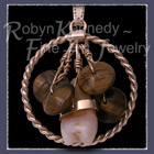 14 Karat Yellow Gold, Tiger's Eye and 'Snake Tooth' Medallion Image
