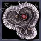 10 Karat Yellow Gold, Sterling Silver and Mozambique Garnet Pendant / Brooch Image