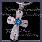10 karat Yellow Gold, Sterlium and Swiss Blue Topaz 'Cherish Cross' Pendant Image