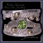 10 Karat Yellow Gold, Sterling Silver and Peridot 'Chic' Ring Image