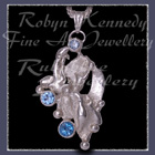 Sterling Silver, Skyblue Topaz, Iceblue Topaz & Swiss Blue Topaz 'Phoenix' Pendant Image