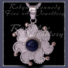 10 Karat Yellow Gold, Sterling Silver and Lapis Lazuli  'Sun' Pendant Image