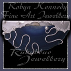 14 Karat Yellow Gold, Sterling Silver and Blue Lace Agate 'Sunset Beach' Brooch Image
