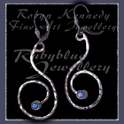 Sterling Silver and Ice Blue Topaz 'Swirls' Earrings Image
