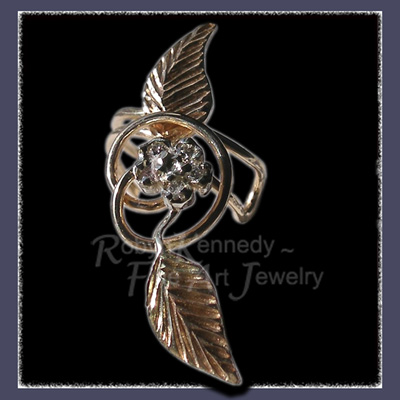 !4 Karat Yellow and White Gold Flower Earcuff accented with Diamonds Image