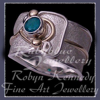 10 Karat Yellow Gold, Sterling Silver and Swiss Blue Topaz 'Serenity' Ring Image