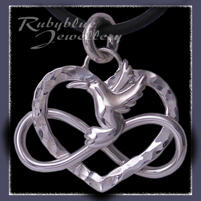 Sterling Silver, Pink Topaz, Blue Zircon 'Love Forever' Pendant Image