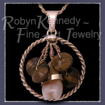14 Karat Yellow Gold, Tiger's Eye Gems and Snake's Tooth Medalliion Image