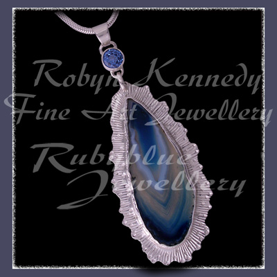 Argentium Silver, Sterling Silver, Blue Lace Agate and Genuine Paradise Blue Topaz 'Blue Crystal Lace' Pendant Image