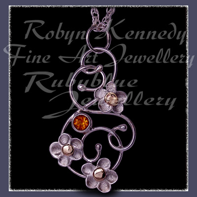 10 Karat Yellow Gold, Sterling Silver & Citrine 'Feeling Groovy'  Pendant Image