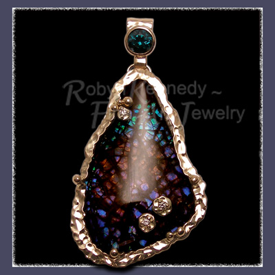 Genuine Ammoite, Green Tourmaline and Diamond Pendant hand constructed in 18 Karat Yellow Gold and Sterling Silver Image