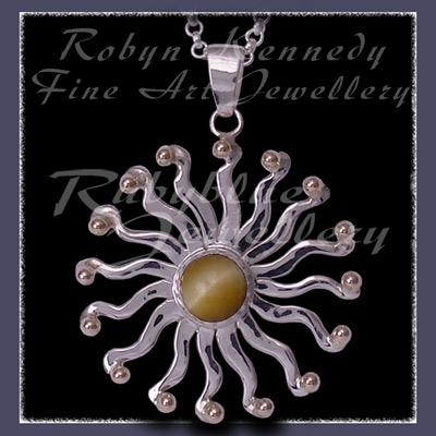 10 Karat Yellow Gold, Sterlling Silver and Honey Tiger's Eye 'Sun' Pendant Image