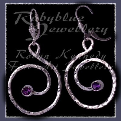 Sterling Silver and AAA Amethyst 'Swirls' Earrings Image